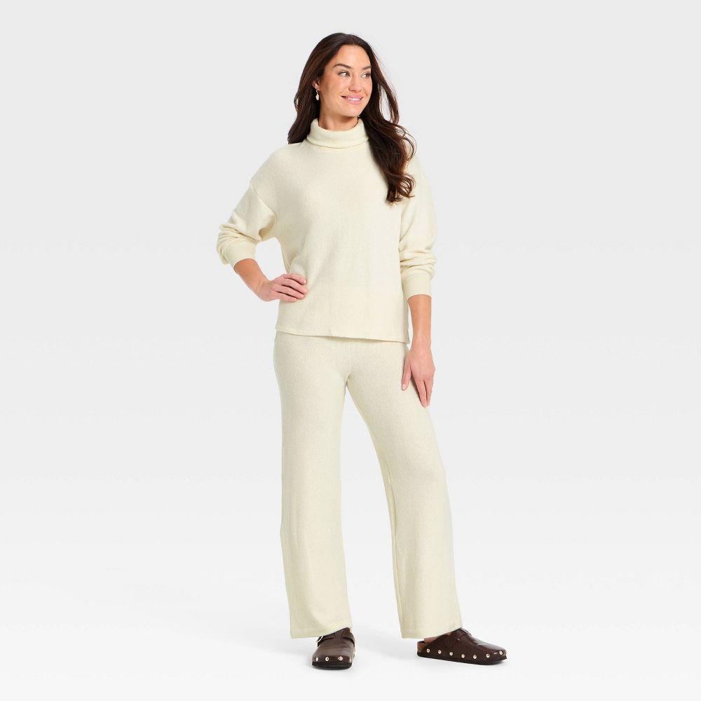 New - Women's Long Sleeve Mock Turtleneck Pullover Blouse - Universal Thread™ Cream S