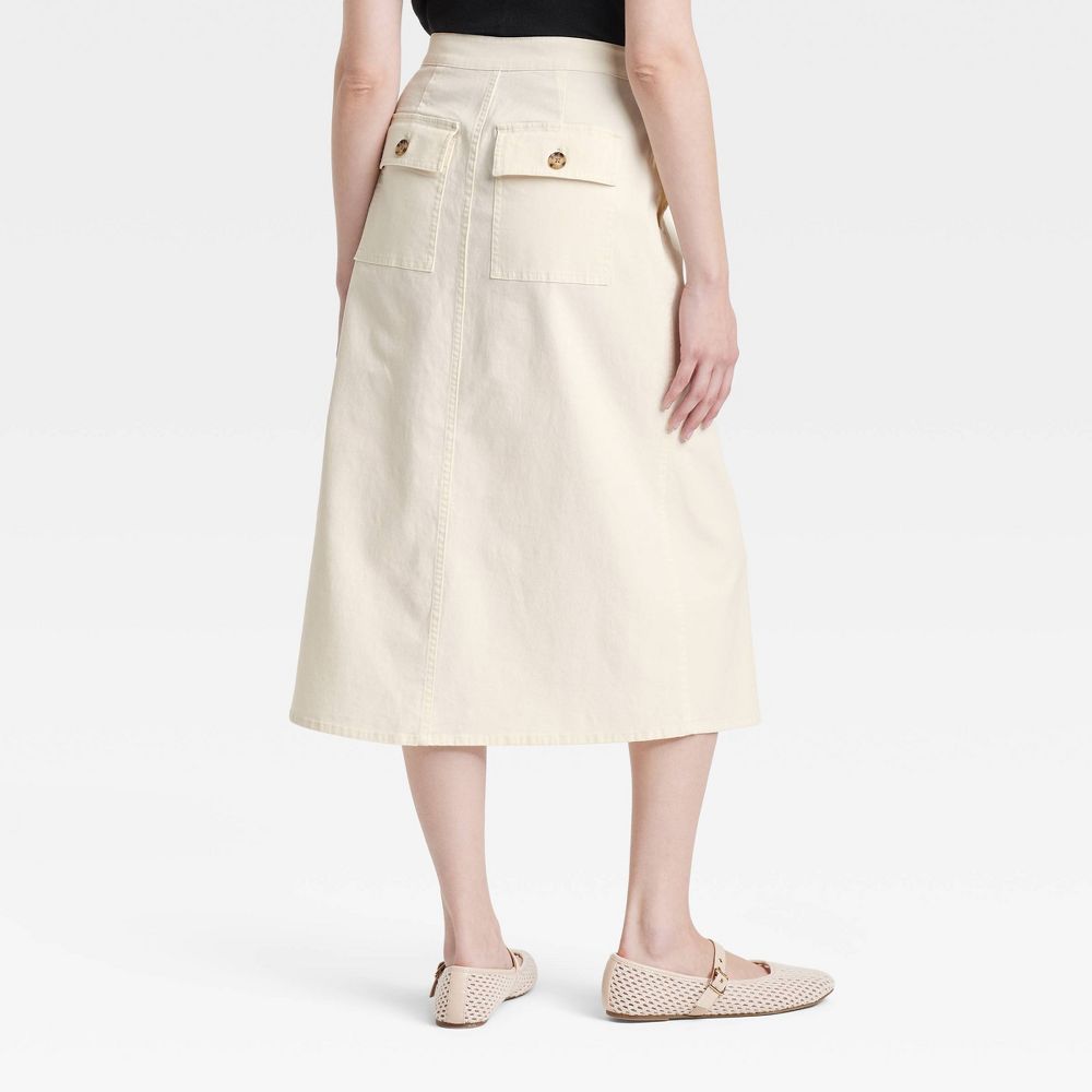 New - Women's Midi Wrap Skirt - Universal Thread™ Cream 2: Mid Rise, Fly Button, Inside Pocket, Machine Washable