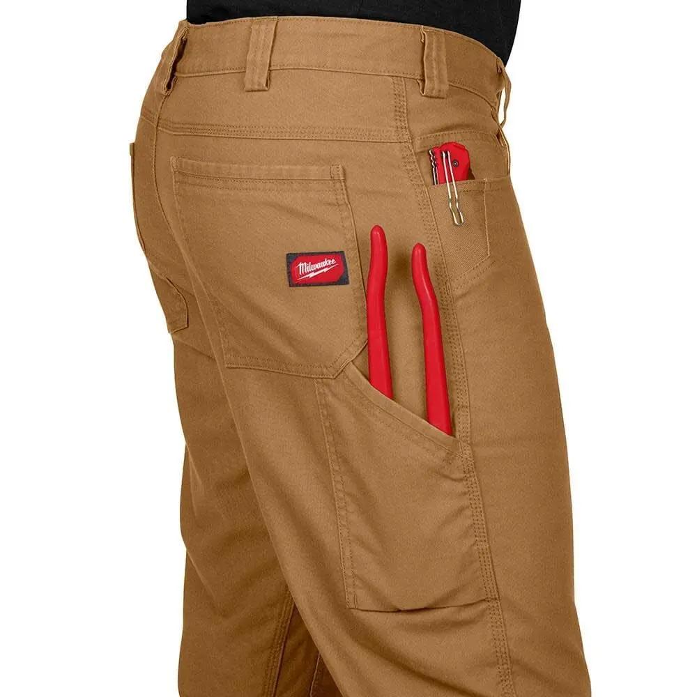 Open Box -  Milwaukee Tool Men's 38 in. x 32 in. Khaki Cotton/Polyester/Spandex HD Flex Work Pants with 6 Pockets Milwaukee ToolBullseye Deals